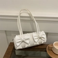 White barrel shoulder bag with large bows made of smooth PU leather for a sweet style - White