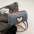 Blue shearling cylinder bag with brown leather trim and heart patch detail - Blue