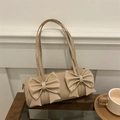 Beige cylindrical baguette bag with decorative oversized 3D bows and slim straps - Khaki