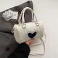 White faux shearling cylinder Boston bag with black heart patch and gold hardware - Off White