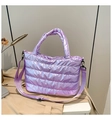 Detail of holographic purple quilted puffer bag with crossbody strap and top handle - Purple