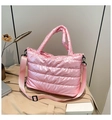 Detail view of pink quilted space cotton shoulder bag with glossy finish and strap - Pink