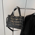Chic black quilted puffer tote bag with puffy finish and detachable crossbody strap - Black