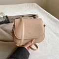 Minimalist beige crossbody saddle bag with flap closure and adjustable strap - Khaki