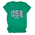 Close-up of USA EST. 1776 floral print on a vibrant green cotton crewneck T-shirt - Dark Green
