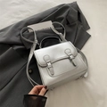 Metallic silver mini backpack with wrinkled PU texture and dual buckle straps for women - Silver