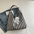 Striped tote bag with white lace bow detail and casual U-shape design for women - Black