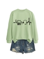Detail of light green 911 sweatshirt with EKG heart graphics and frayed denim shorts - Olive Green Sweatshirt (Black Font)