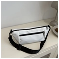 Close-up of white nylon crossbody bag with black zippers and adjustable strap detail - White