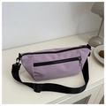 Detail of lavender nylon sling bag featuring high-quality zippers and adjustable strap - Purple