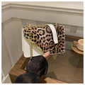 Detail of leopard print patchwork crossbody bag with golden chain and metal trim - White