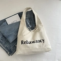 Borsa hobo in tela color crema con fiocco decorativo e stampa del logo Rebawancy - Bianco