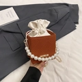 Brown woven box bag with elegant white pearl handle and golden chain strap for women - Brown