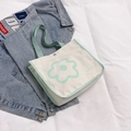 Minimalist canvas tote bag in off-white with mint green flower design and handles - Green