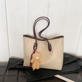 Chic off-white large tote bag with dark brown straps and a cute plush bear charm - With Pendant / White