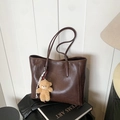 Dark brown faux leather tote bag with slim straps and a cute plush bear pendant accessory - With Pendant / Brown