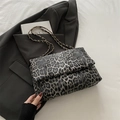 Large leopard print shoulder bag with black-grey pattern and gold chain strap - Black