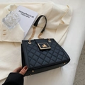 Classic black quilted crossbody bag with a gold lock and chain strap for women - Black
