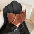 Minimalist brown suede crescent crossbody bag with leather strap and zipper closure - Brown