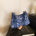 French retro crescent bag featuring blue leopard print and decorative metal handle - Blue