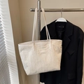 Minimalist cream white corduroy tote bag for commuting with a vintage textured finish - Off White