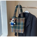 Detail of tweed check tote bag in dark green and brown with a cute plush dog pendant - With Pendant / Green