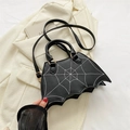 Unique black bat-shaped crossbody bag with white spiderweb stitching and top handles - Black