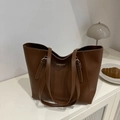 Brown leather large capacity tote bag with dual straps and fashion text on front - Dark Brown