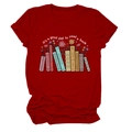 Detailed view of the colorful book and flower graphic print on this red cotton t-shirt - Red (White Text)