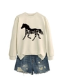 Detailed view of cream sweatshirt with horse floral print and distressed denim shorts - Sand