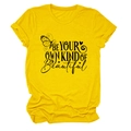 Detail of yellow cotton T-shirt featuring black butterfly print and artistic typography - S / Tops / Yellow