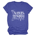 Detail view of Be Your Own Kind of Beautiful text with butterfly print on heather blue shirt - S / Tops / Vintage Blue