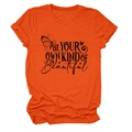 Detail of the orange cotton T-shirt featuring a butterfly and Be Your Own Kind Of Beautiful print - S / Tops / Orange
