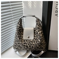 Detail of leopard print tote bag featuring silver metallic leather and round buckle - Silver