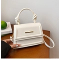 Minimalist white faux leather tote bag with quilted flap and gold metal buckle - White