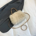 Fashionable beige faux fur crossbody bag with soft texture and leather strap details - Khaki