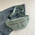 Minimalist light green corduroy chest bag with adjustable strap and multiple zippers - Light Green