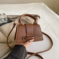 Brown litchi pattern mini crossbody bag with top handle and trapezoidal shape - Brown
