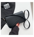 Minimalist black leather shoulder bag with asymmetric flap and golden hardware accents - Black