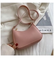 Chic pink leather half-moon shoulder bag with gold zipper for everyday fashion - Pink