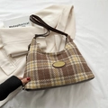 Brown plaid tweed underarm bag with gold oval plaque and adjustable leather shoulder strap - Brown