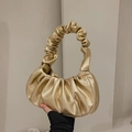 Metallic champagne cloud bag with pleated design and soft ruched top handle for women - Gold