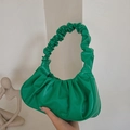 Chic emerald green ruched cloud handbag featuring a soft leather pleated design - Green
