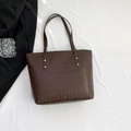 Deep brown quilted tote bag with golden rivets on long shoulder straps for daily commute - Dark Brown