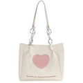 Dettaglio borsa tote color crema con cuore rosa e tracolla a catena argentata - Bianco Sporco