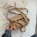 Minimalist beige pleated crossbody bag with woven decorative strap and gold hardware - Khaki