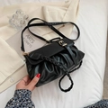 Fashionable black pleated cloud bag in PU leather with gold hardware and woven handle - Black