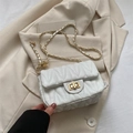 Chic white quilted crossbody bag with gold chain strap and metal ball detail - White