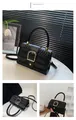 Detailed views of a black embossed square bag with golden buckle and adjustable strap - Black
