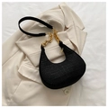 Black crocodile embossed underarm bag with gold chain strap on beige blazer - Black